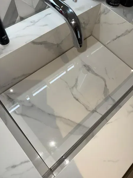 A polished basin and tap